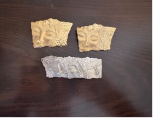 JJ elegant hidden faces brooch and earrings
