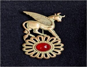 JJ winged bull brooch